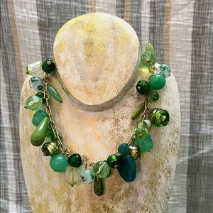 Vintage 16” beaded necklace.  Various designs in multiple shades of green